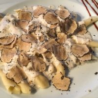 bowl of truffle pasta served on Croatia food tour