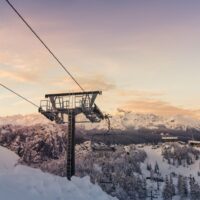 ski lift at sunset on snowy mountain at Vogel ski resort Slovenia